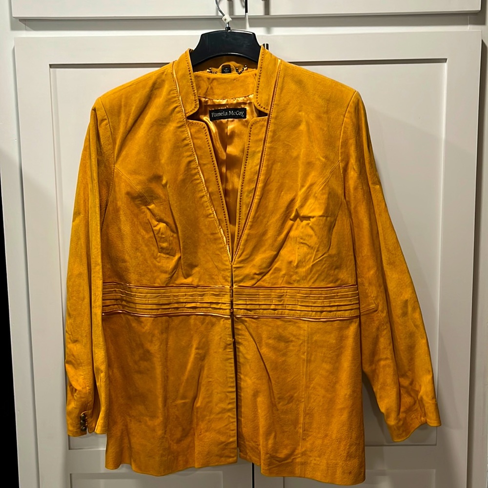 100% suede and leather Pamela McCoy 2X. Pumpkin color, embroidery and stitching.